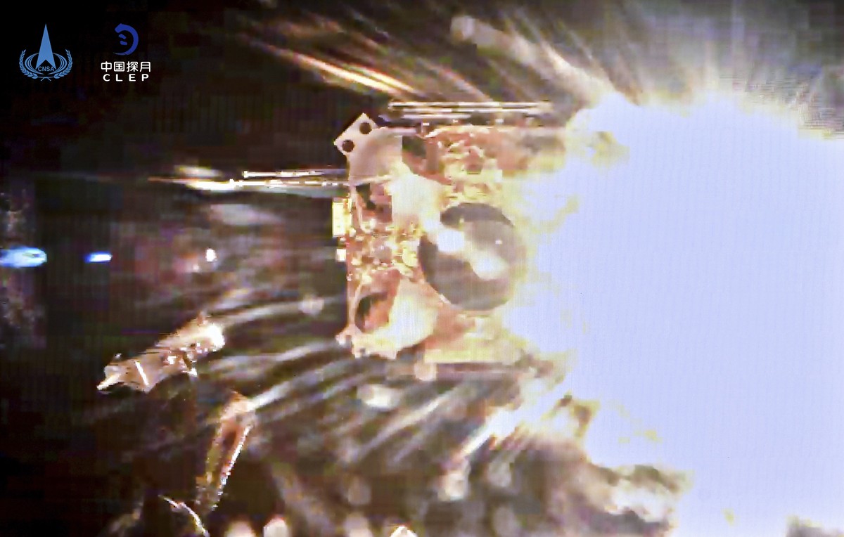 This image provided by China National Space Administration shows the ascender of Chang'e-5 spacecraft blasting off from the moon surface on Thursday, Dec. 3, 2020. A Chinese lunar probe lifted of ...