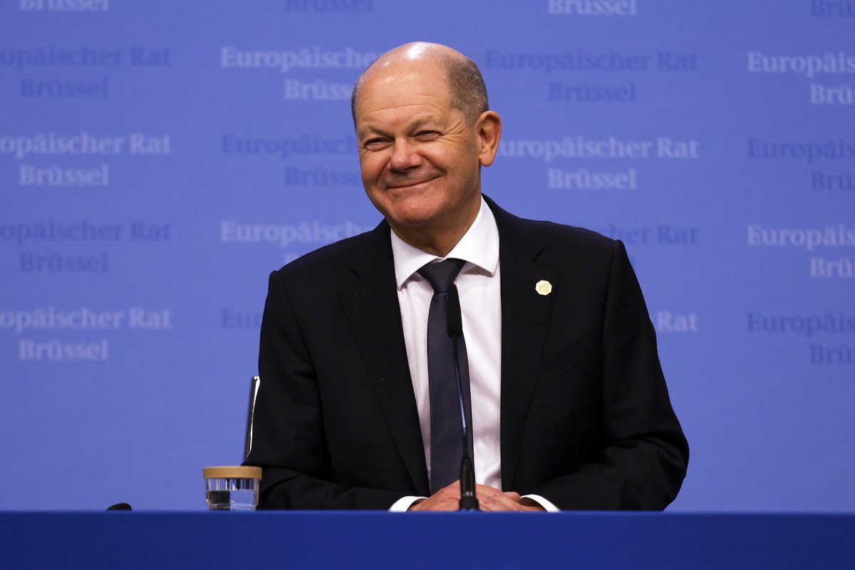 Germany's Chancellor Olaf Scholz talks to journalists in a news conference during an EU summit in Brussels, Thursday, Feb. 1, 2024. The leaders of the 27 European Union countries sealed a deal on ...