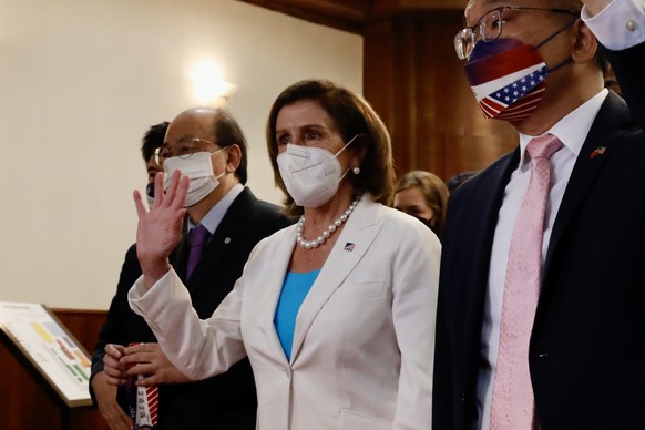 epa10103345 US House Speaker Nancy Pelosi (C), arrives to the Legislative Yuan for a meeting with Taiwanese legislators in Taipei, Taiwan, 03 August 2022. China has raised a warning, stating its milit ...