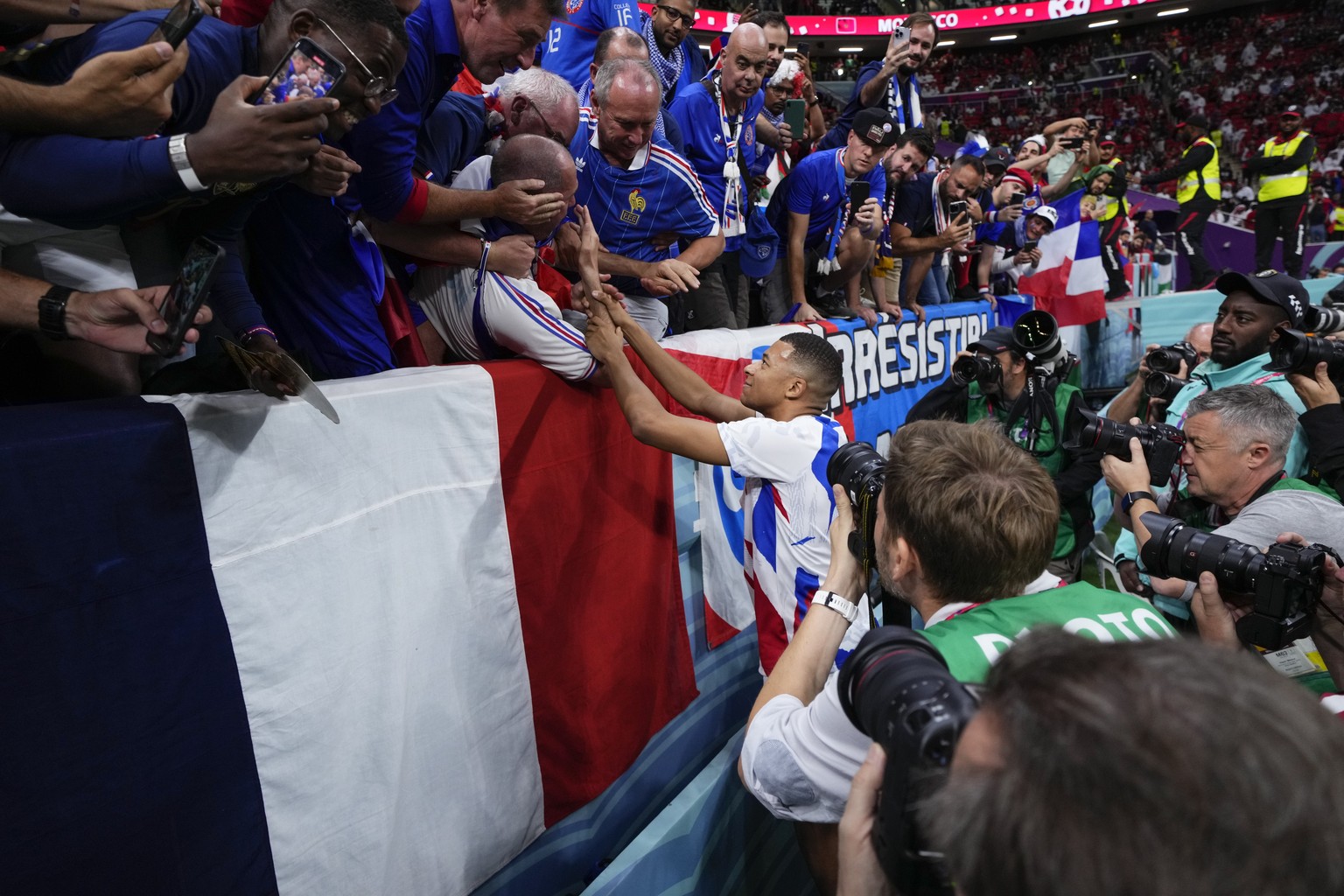 France&#039;s Kylian Mbappe greets fans before the World Cup semifinal soccer match between France and Morocco at the Al Bayt Stadium in Al Khor, Qatar, Wednesday, Dec. 14, 2022. (AP Photo/Manu Fernan ...