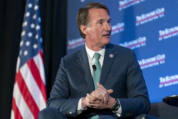 FILE - Republican Virginia Gov. Glenn Youngkin speaks to David Rubenstein during an interview hosted by the Economic Club of Washington, Sept. 26, 2023, in Washington. A Washington-based attorney conf ...
