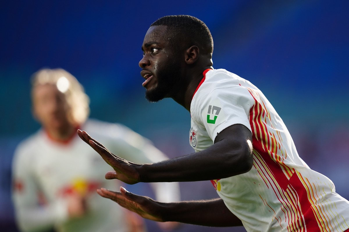 epa09007768 (FILE) Leipzig's Dayot Upamecano (R) celebrates after scoring the 1-1 goal during the German Bundesliga soccer match between RB Leipzig and Hertha BSC Berlin in Leipzig, Germany, 24 O ...