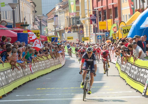 epa04834043 Australian rider David John Tanner of the IAM Cycling team crosses the finish line to win the 2nd stage of the 67th Tour of Austria cycling race over 196km from Litschau to Grieskirchen, A ...