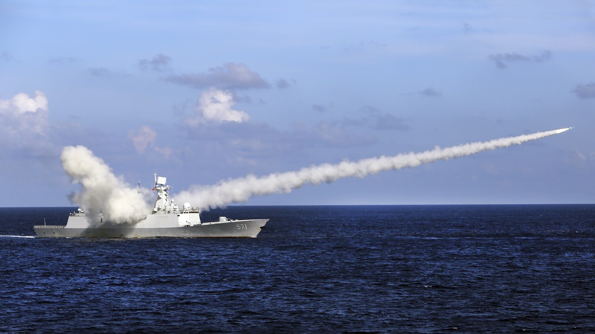 FILE - In this July 8, 2016, file photo released by Xinhua News Agency, Chinese missile frigate Yuncheng launches an anti-ship missile during a military exercise in the waters near south China's  ...