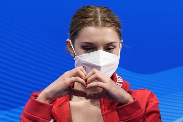 Alexia Paganini, of Switzerland, reacts after competing in the women&#039;s free skate program during the figure skating competition at the 2022 Winter Olympics, Thursday, Feb. 17, 2022, in Beijing. ( ...