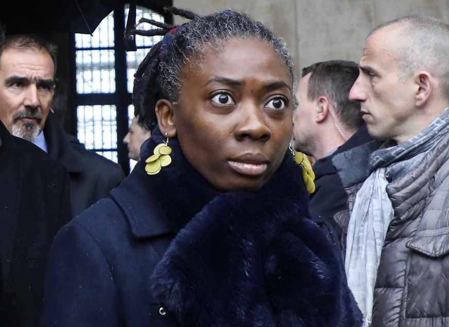 In this photo taken on March 28, 2018, Danielle Obono arrives at a ceremony at the Hotel des Invalides in Paris. A French magazine has apologized after portraying a Black lawmaker as a slave, as Franc ...