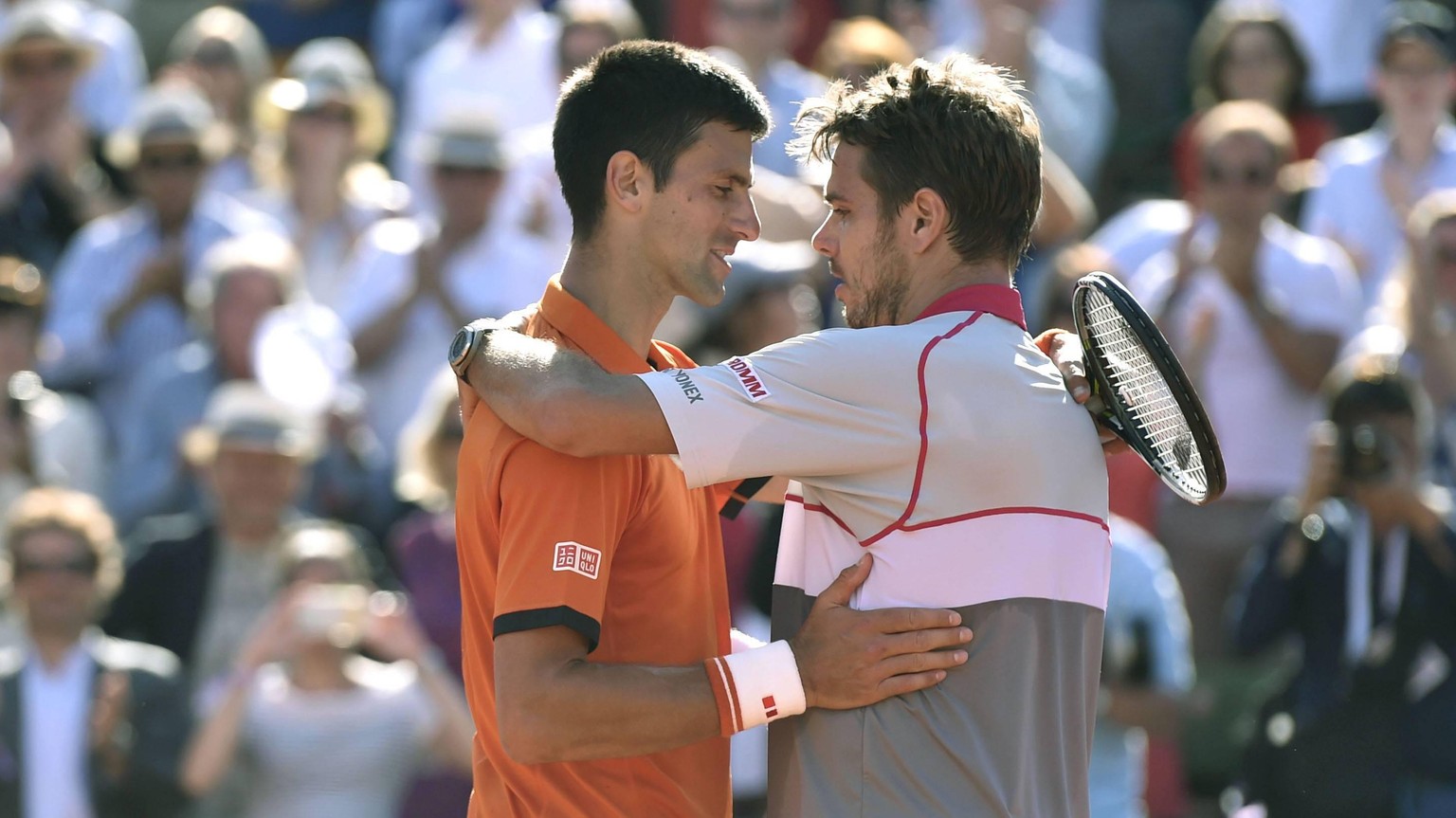 Wawrinka defeats Djokovic in French Open final Stan Wawrinka of Switzerland (R) and Novak Djokovic of Serbia praise each other following the French Open final match on June 7, 2015, in Paris. Wawrinka ...