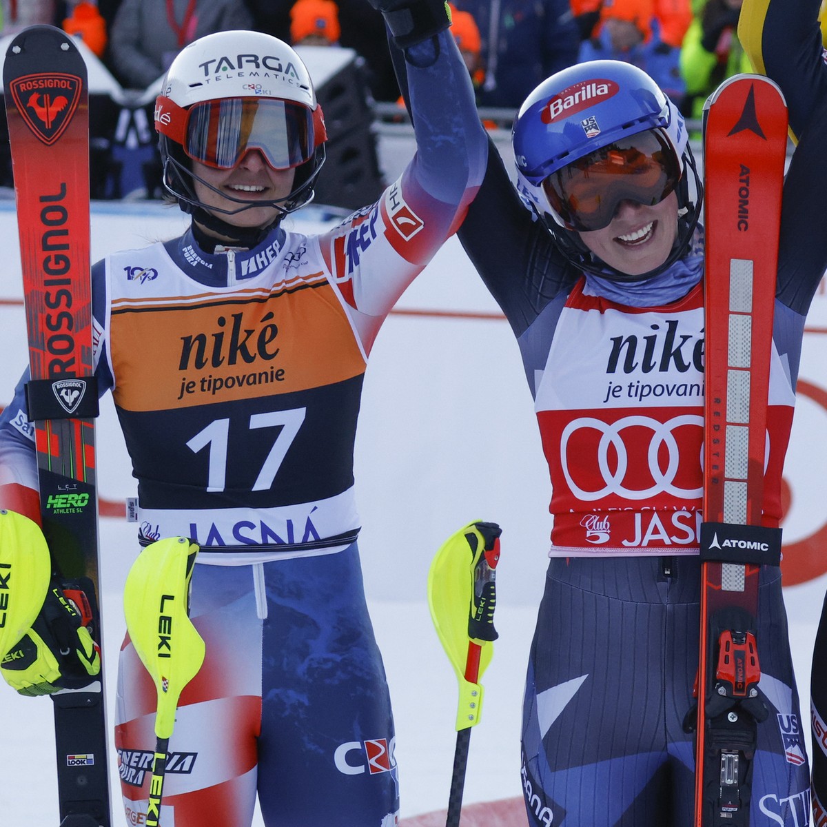 United States' Mikaela Shiffrin, center, winner of an alpine ski, women's World Cup slalom race, celebrates with second-placed Croatia's Zrinka Ljutic, left, and third-placed Slovenia&# ...