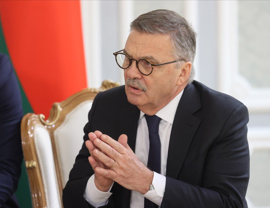 epa08931006 Rene Fasel, the president of the International Ice Hockey Federation (IIHF), talks during his meeting with Belarusian President Alexander Lukashenko in Minsk, Belarus, 11 January 2021. EPA ...