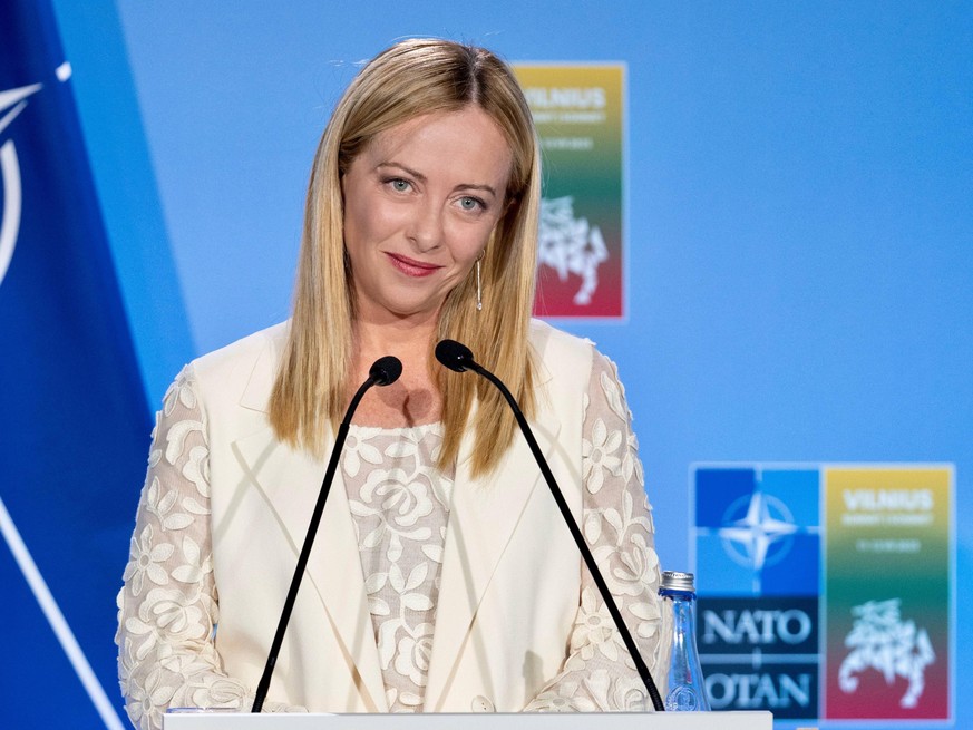 epa10742148 A handout picture made available by the Chigi Palace (Palazzo Chigi) Press Office shows Italian Prime Minister Giorgia Meloni holding a press conference at the end of the NATO Summit in Vi ...