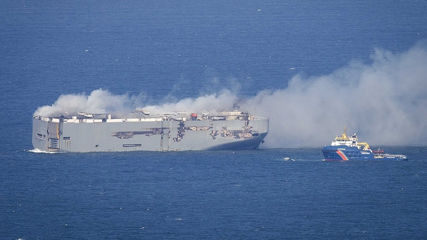 epa10770010 The cargo ship Fremantle Highway is on fire in the North Sea north of Ameland, the Netherlands, 26 July 2023. A fire broke out overnight on 26 July on the Fremantle Highway, a freighter wi ...