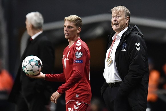 epa07915604 Denmark&#039;s head coach Age Hareide (R) during the UEFA EURO 2020 qualifiers match between Denmark and Switzerland at the Telia Parken stadium in Copenhagen, Denmark, 12 October 2019. EP ...