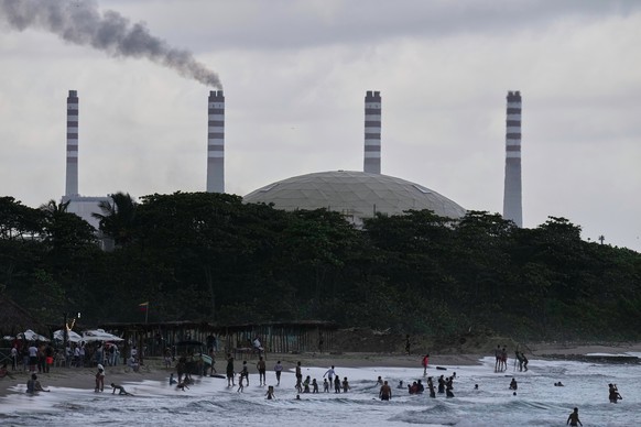 The El Palito refinery rises above a beach in Puerto Cabello, Venezuela, Sunday, Dec. 21, 2025. (AP Photo/Matias Delacroix)
APTOPIX Venezuela Oil