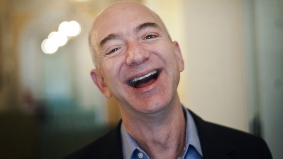 epa07353115 (FILE) - US entrepreneur, founder and president of internet company Amazon, Jeff Bezos smiles at the Bayerischer Hof in Munich, Germany, 11 October 2012 (reissued on 08 February 2019). Acc ...