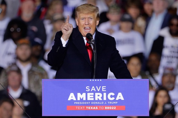 epa09717405 Former US president Donald Trump speaks at a Save America Rally, held outdoors at the Montgomery County Fairgrounds in Conroe, Texas, USA, 29 January 2022. Trump has been holding rallies a ...