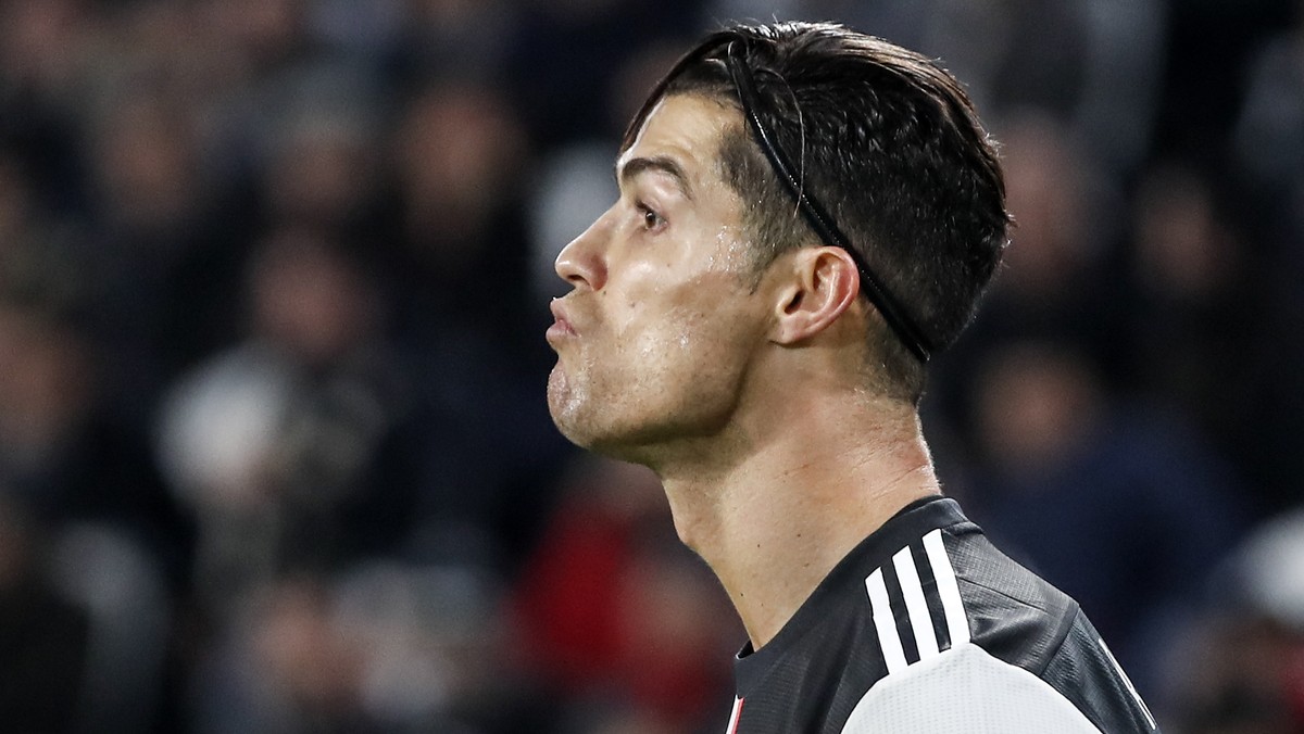 Juventus' Cristiano Ronaldo reacts during the Champions League group D soccer match between Juventus and Atletico Madrid at the Allianz stadium in Turin, Italy, Tuesday, Nov. 26, 2019. (AP Photo/ ...