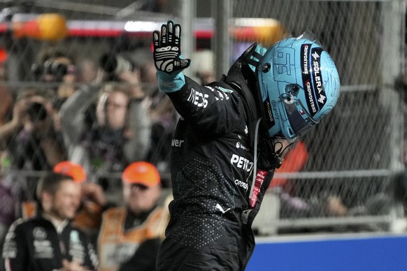 Mercedes driver George Russell, of Britain, celebrates are winning the F1 Las Vegas Grand Prix auto race, Saturday, Nov. 23, 2024, in Las Vegas. (AP Photo/Matt York)