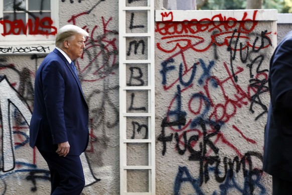 EDS NOTE: OBSCENITY - President Donald Trump walks from the White House through Lafayette Park to visit St. John&#039;s Church Monday, June 1, 2020, in Washington. (AP Photo/Patrick Semansky)