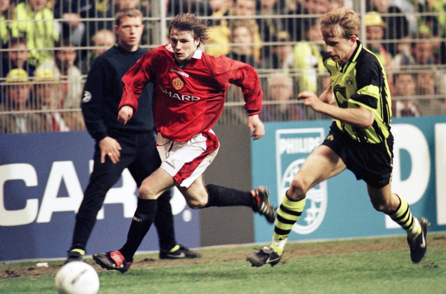 Bildnummer: 09286998 Datum: 09.04.1997 Copyright: imago/Colorsport
DAVID BECKHAM (MAN U) and Jörg Heinrich (BVB) . BORUSSIA DORTMUND V MANCHESTER UNITED. UEFA CHAMPIONS LEAGUE SEMI FINAL, 09/04/1997.  ...