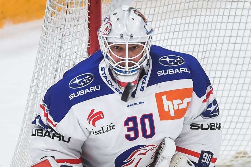 Zurich&#039;s goalkeeper Lukas Flueler in action, during the preliminary round game of National League (NLA) Swiss Championship 2020/21 between HC Lugano against ZSC Lions at the ice stadium Corner Ar ...