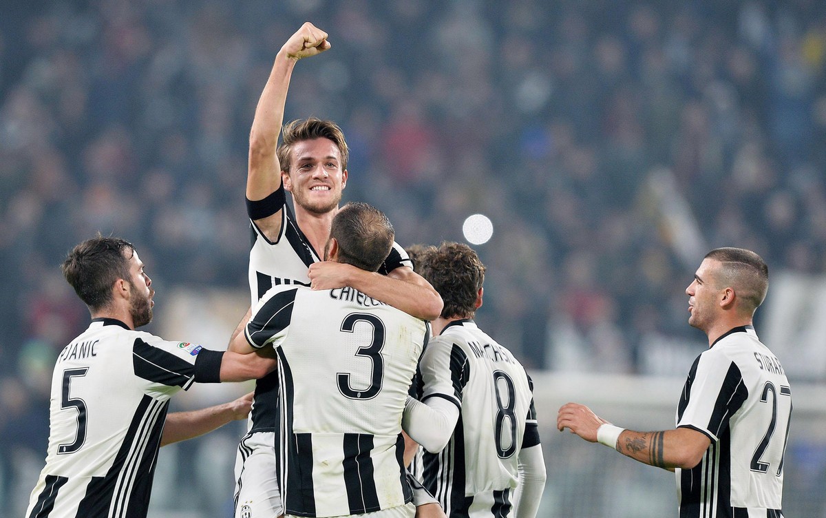 Juventus' Daniele Rugani, center top, celebrates after scoring during a Serie A soccer match between Juventus and Atalanta, at the Juventus Stadium in Turin, Italy, Saturday, Dec. 3, 2016. (Aless ...