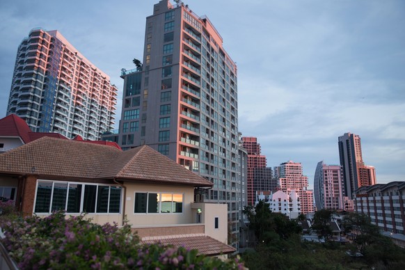 Sunset in Pratumnak, Pattaya. Sunset on the roof. Pattaya city view on sunset. Skyscrapers of Pratumnak, Pattaya.