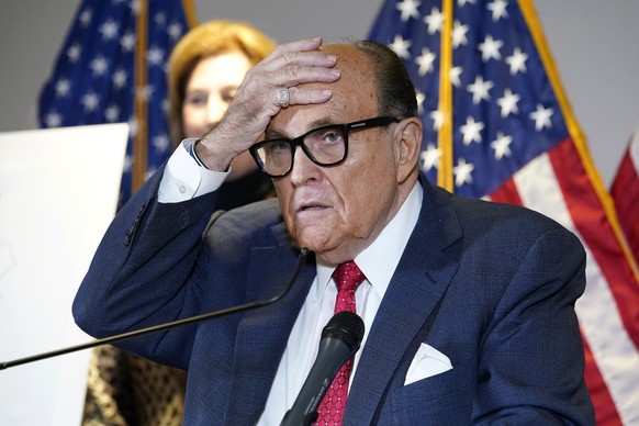 FILE - In this Nov. 19, 2020, file photo, former New York Mayor Rudy Giuliani, who was a lawyer for President Donald Trump, speaks during a news conference at the Republican National Committee headqua ...