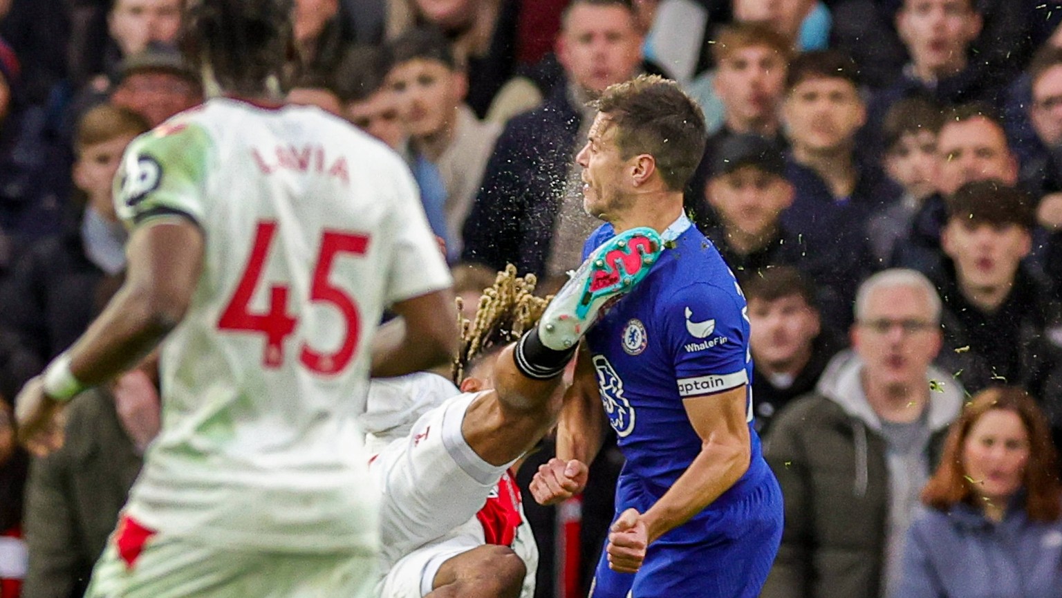 Chelsea v Southampton Premier League 18/02/2023. Theo Walcott 32 of Southampton clashes with Cesar Azpilicueta 28 of Chelsea during the Premier League match between Chelsea and Southampton at Stamford ...