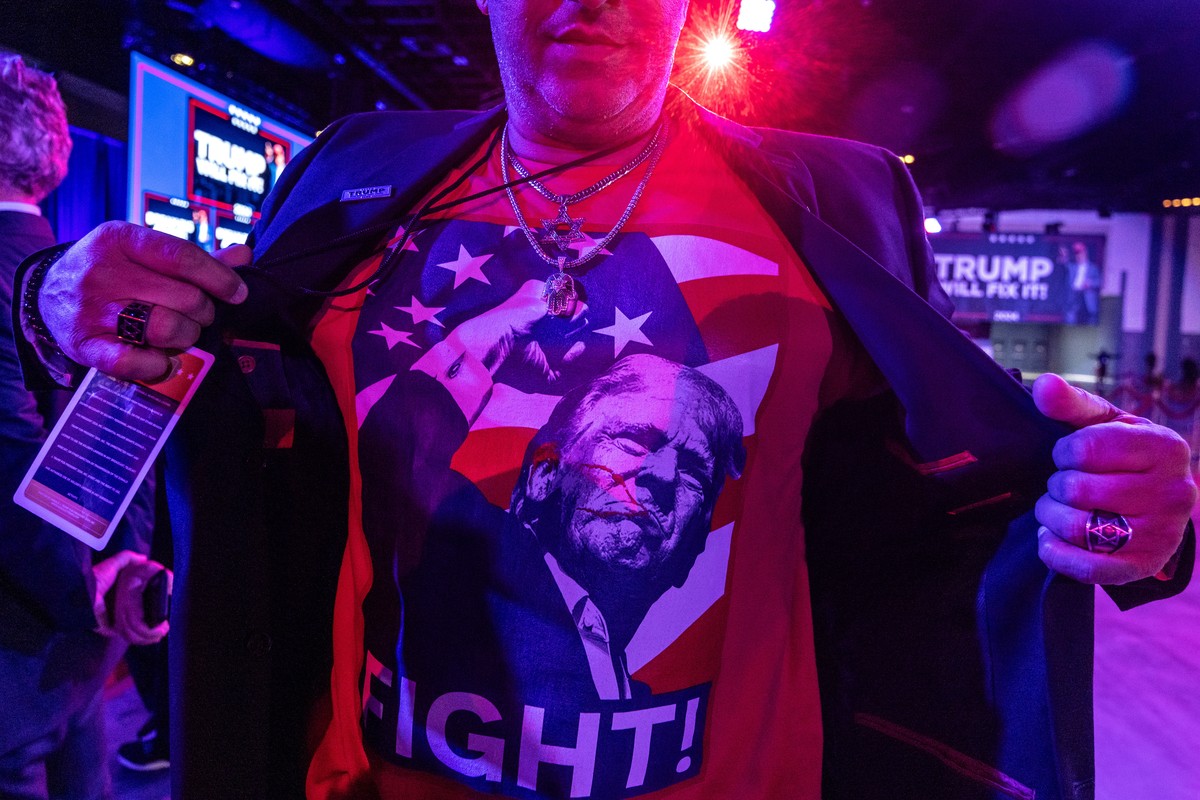 epa11704228 A supporter of former US president and Republican presidential candidate Donald Trump reacts as they wait for results of the US 2024 presidential elections during an election night watch p ...