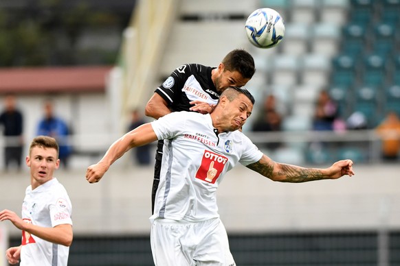 Lugano&#039;s player Jonathan Sabbatini leftt fight for the ball with Luzern&#039;s player Stefan Knezevic left, during the Super League soccer match FC Lugano against FC Luzern, at the Cornaredo stad ...