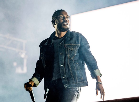 FILE - In this July 7, 2017, file photo, Kendrick Lamar performs during the Festival d&#039;ete de Quebec in Quebec City, Canada.On Monday, April 16, 2018, Lamar won the Pulitzer Prize for music for h ...