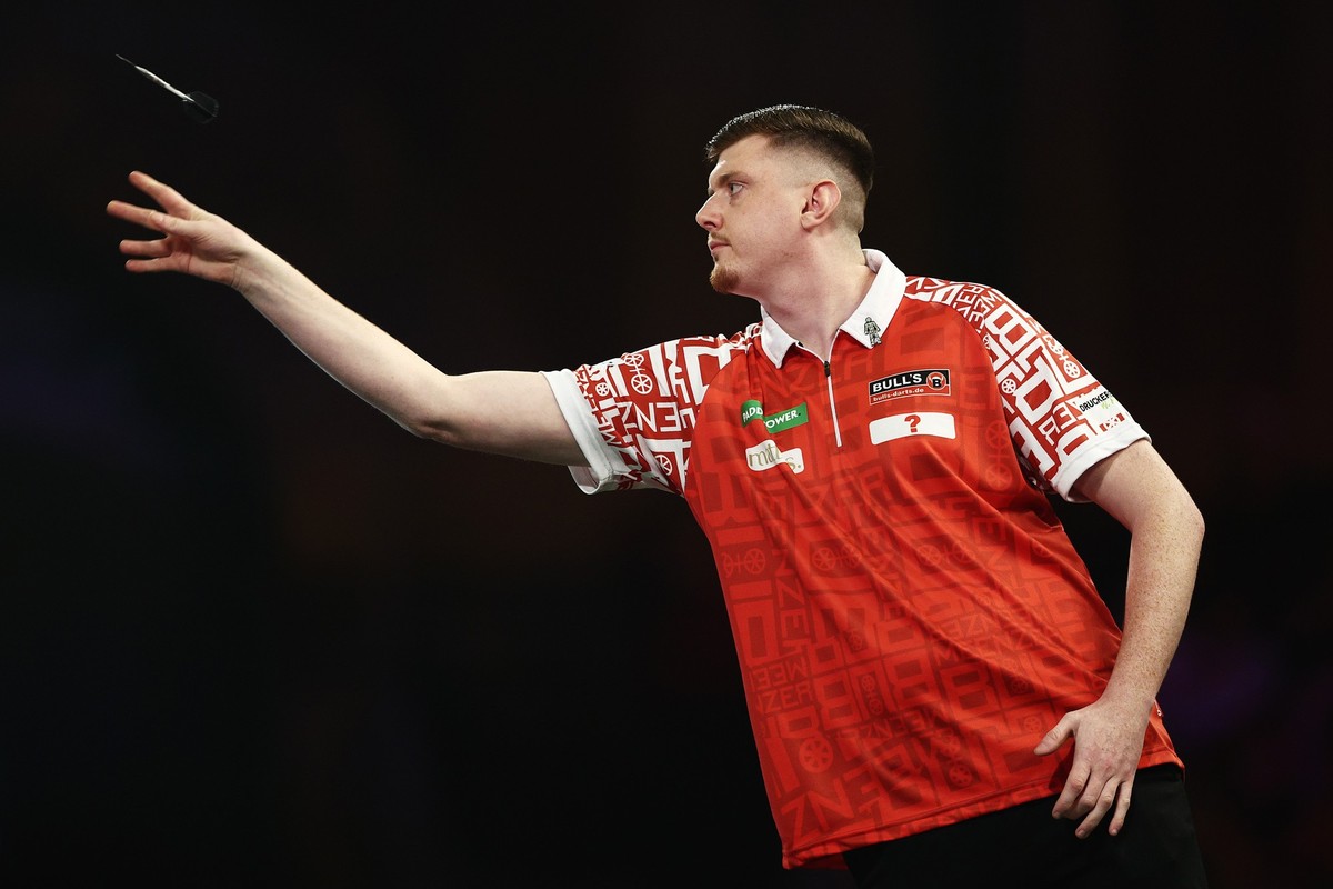 LONDON, ENGLAND - DECEMBER 19: Niko Springer of Germany competes against Scott Williams of England in their first round match during day five of the 2024/25 Paddy Power World Darts Championship at Ale ...
