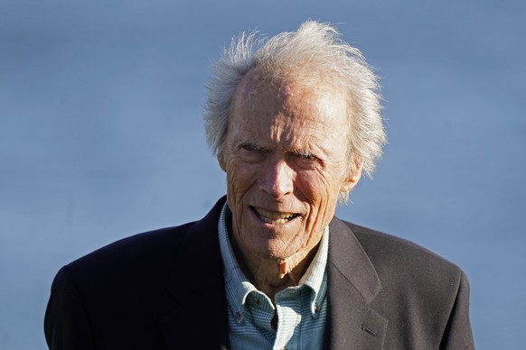 Clint Eastwood stands on the 18th green of the Pebble Beach Golf Links during the awards presentation of the AT&amp;T Pebble Beach Pro-Am golf tournament in Pebble Beach, Calif., Sunday, Feb. 6, 2022. ...