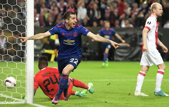 epa05987636 Manchester United&#039;s Henrikh Mkhitaryan (C) celebrates after scoring the 2-0 lead during the UEFA Europa League final between Ajax Amsterdam and Manchester United at Friends Arena in S ...