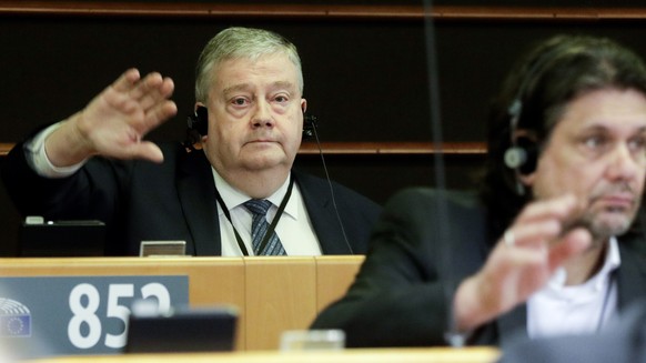 epa10444049 Member of the European Parliament Belgian Marc Tarabella votes for the waiver of the immunity during a plenary session of the European Parliament in Brussels, Belgium, 02 February 2023. Eu ...