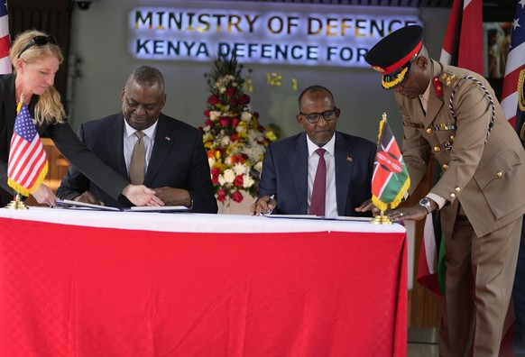 US Secretary of Defense Lloyd J. Austin, left and Kenya Cabinet Secretary for Defense Aden Duale, sign a bilateral defense cooperation agreement in Nairobi, Kenya, Monday Sept. 25, 2023. The U.S. and  ...