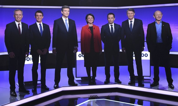 French politicians (LtoR) Francois de Rugy, Manuel Valls, Arnaud Montebourg, Sylvia Pinel, Benoit Hamon, Vincent Peillon and Jean-Luc Bennahmias attend the final prime-time televised debate for the Fr ...