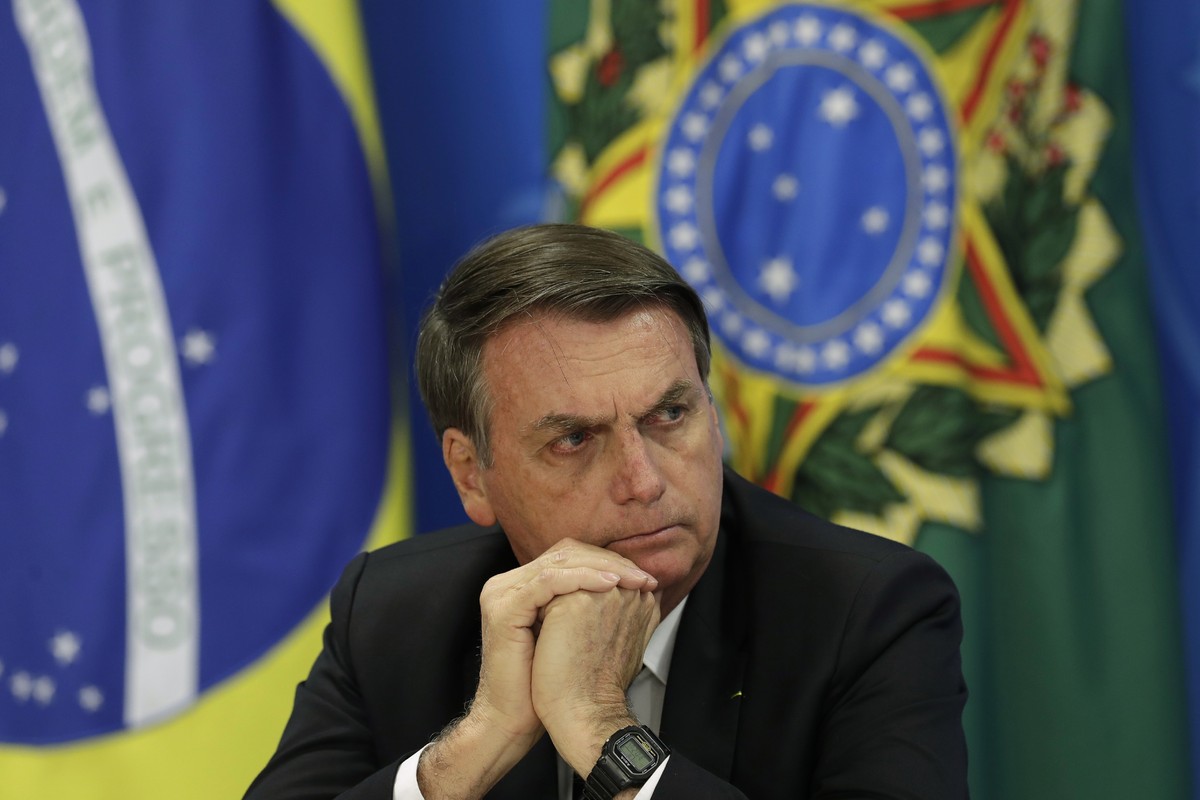 Brazil's President Jair Bolsonaro holds a press conference on deforestation in the Amazon at the Planalto presidential palace in Brasilia, Brazil, Thursday, Aug. 1, 2019. Bolsonaro is threatening ...