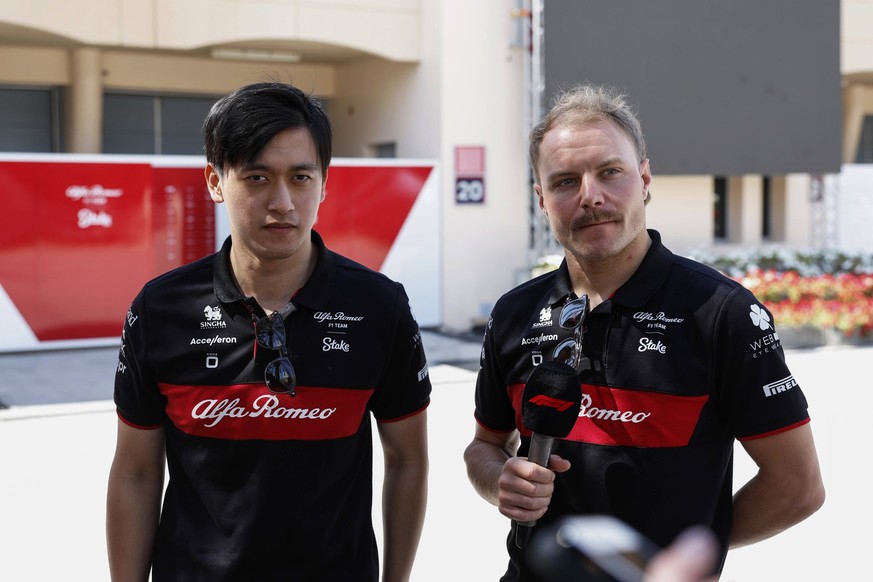 Formula 1 2023: Bahrain GP BAHRAIN INTERNATIONAL CIRCUIT, BAHRAIN - MARCH 02: Zhou Guanyu, Alfa Romeo F1 Team, and Valtteri Bottas, Alfa Romeo F1 Team during the Bahrain GP at Bahrain International Ci ...