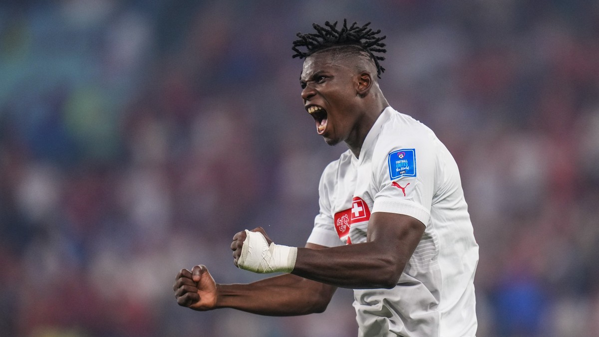 Switzerland's Breel Embolo celebrates after his teammate Switzerland's Remo Freuler scored his side's third goal during the World Cup group G soccer match between Serbia and Switzerland ...