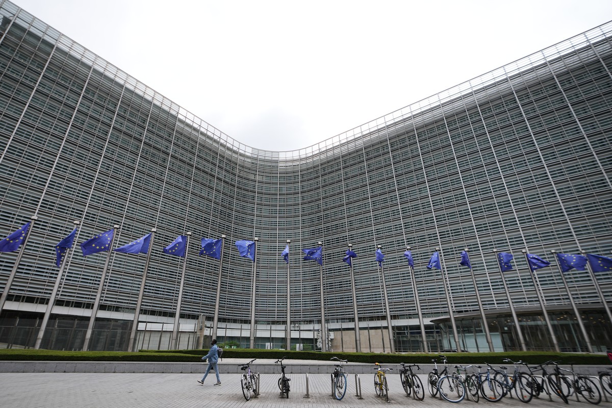 European Union flags flap in the wind outside EU headquarters in Brussels, prior to an announcement regarding Google, Thursday, July 23, 2026. (AP Photo/Virginia Mayo)
Belgium EU Google