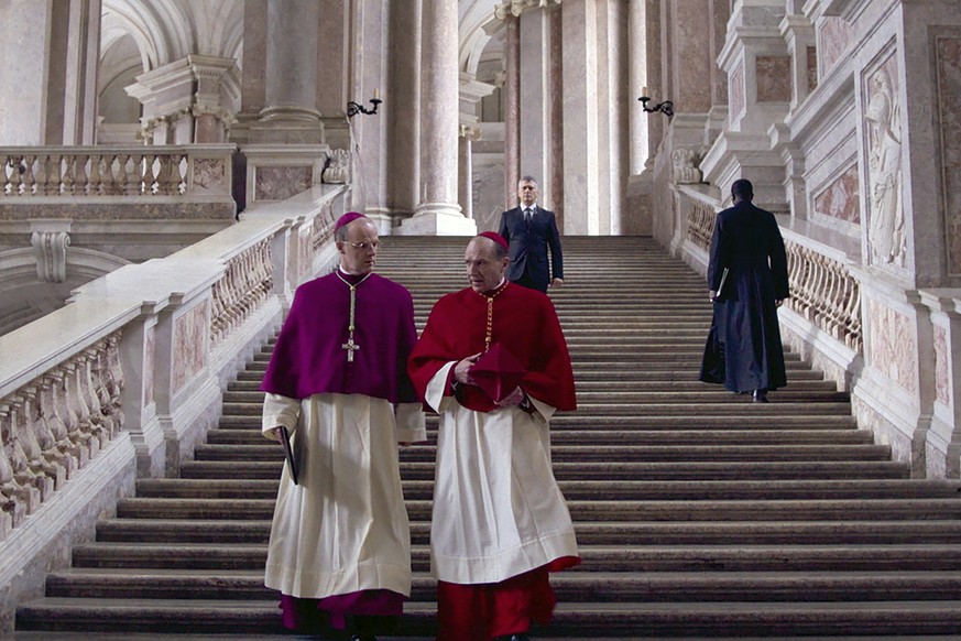 This image released by Focus Features shows Br�an F. O&#039;Byrne, left, and Ralph Fiennes in a scene from &quot;Conclave.&quot; (Focus Features via AP)