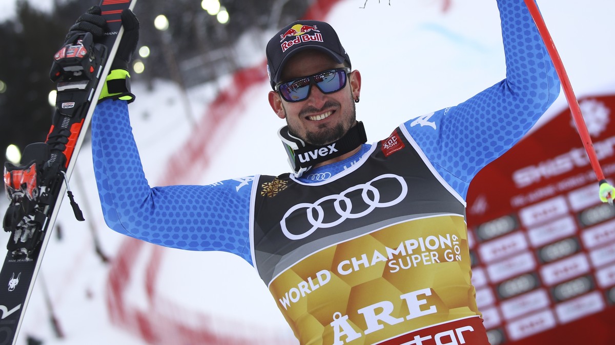Italy's Dominik Paris celebrates in the finish area after winning the men's super-G, in Are, Sweden, Wednesday, Feb. 6, 2019. (AP Photo/Marco Trovati)