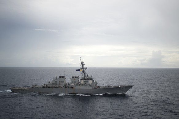 FILE - In this Oct. 13, 2016, file photo provided by the U.S. Navy, guided-missile destroyer USS Decatur (DDG 73) operates in the South China Sea as part of the Bonhomme Richard Expeditionary Strike G ...