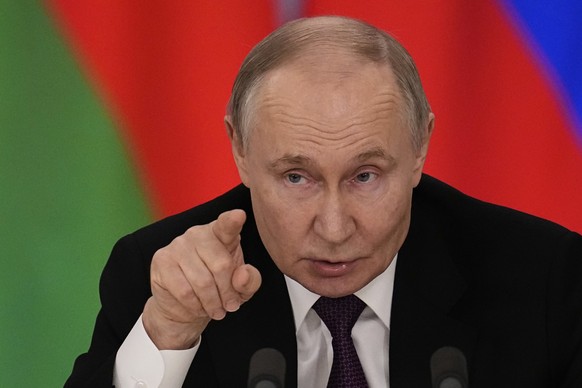 Russian President Vladimir Putin speaks during a joint news conference with Belarusian President Alexander Lukashenko following their talks at the Grand Kremlin Palace in Moscow, Russia, Thursday, Mar ...