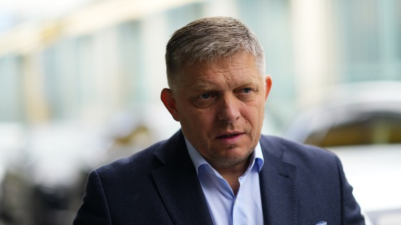 FILE - Chairman of SMER-Social Democracy party Robert Fico arrives at his party&#039;s headquarters in Bratislava, Slovakia, Sunday, Oct. 1, 2023 the day after an early parliamentary election. Media r ...
