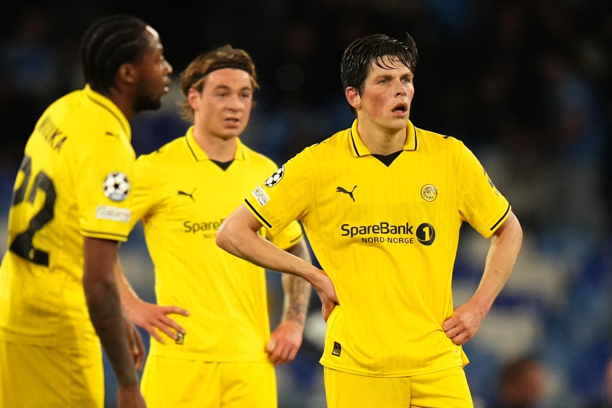 Glimt players stand after their teammate Odin Bjortuft made an own goal during the Champions League opening phase soccer match between Napoli and Bodo Glimt in Naples, Italy, Tuesday, Oct. 20, 2026. ( ...
