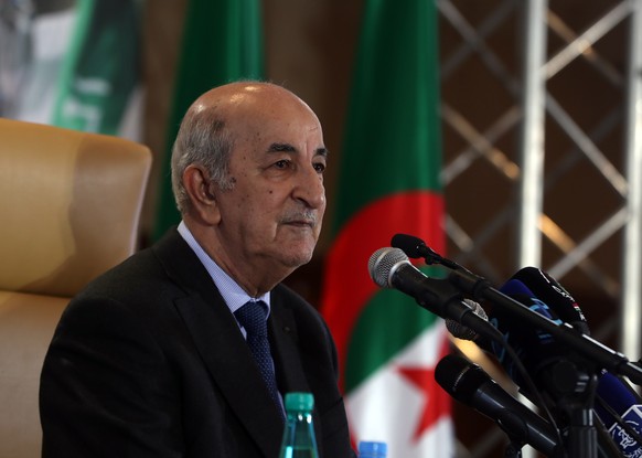 epa08770336 (FILE) - Algerian President-elect Abdelmadjid Tebboune speaks during a press conference in Algiers, Algeria, 13 December 2019 (reissued 24 October 2020). According to a presidency press release, Algerian President Abdelmadjid Tebboune will start a five-day voluntary quarantine as per medical staff of the presidency advice after senior officials showed symptoms of Coronavirus infection.  EPA/MOHAMED MESSARA *** Local Caption *** 55707557