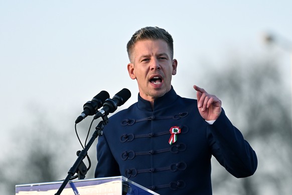 epa12822354 President of the opposition Tisza Party, Peter Magyar addresses his supporters during the National March in Budapest, Hungary, 15 March 2026, on the occasion of the national holiday to mar ...