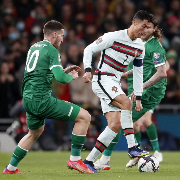 Portugal&#039;s Cristiano Ronaldo, center, controls the ball during the World Cup 2022 group A qualifying soccer match between the Republic of Ireland and Portugal at the Aviva stadium in Dublin, Thur ...